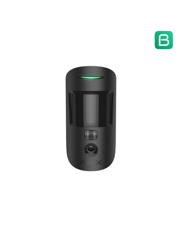 Melns kustību sensors ar kameru, uzstādīts uz sienas, ar LED indikatoru un modernu dizainu.